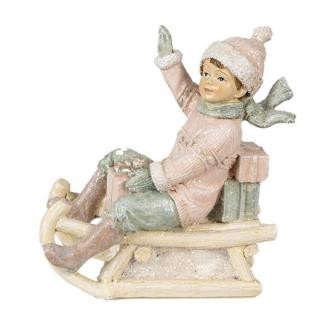 Rózsaszín ruhás kisfiú szánon - 10x5x10cm - Karácsonyi dekoráció