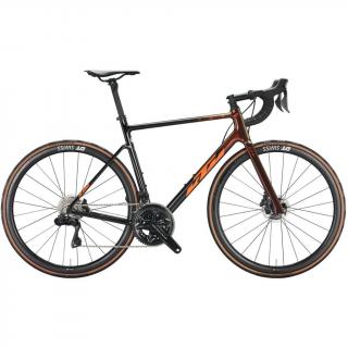 KTM REVELATOR ALTO EXONIC CARBON (SUNSET+ORANGE) 2022 FÉRFI ORSZÁGÚTI KERÉKPÁR - 57 CM